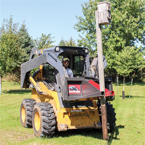 pulling trees with skid steer|used skid steer tree puller.